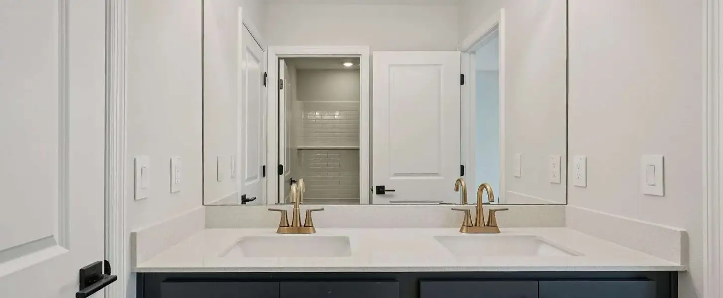 Bathroom 2 featuring double sinks - representative image this home will feature AW Collection® Laguna Bathroom 2 featuring double sinks - representative image this home will feature AW Collection® Laguna