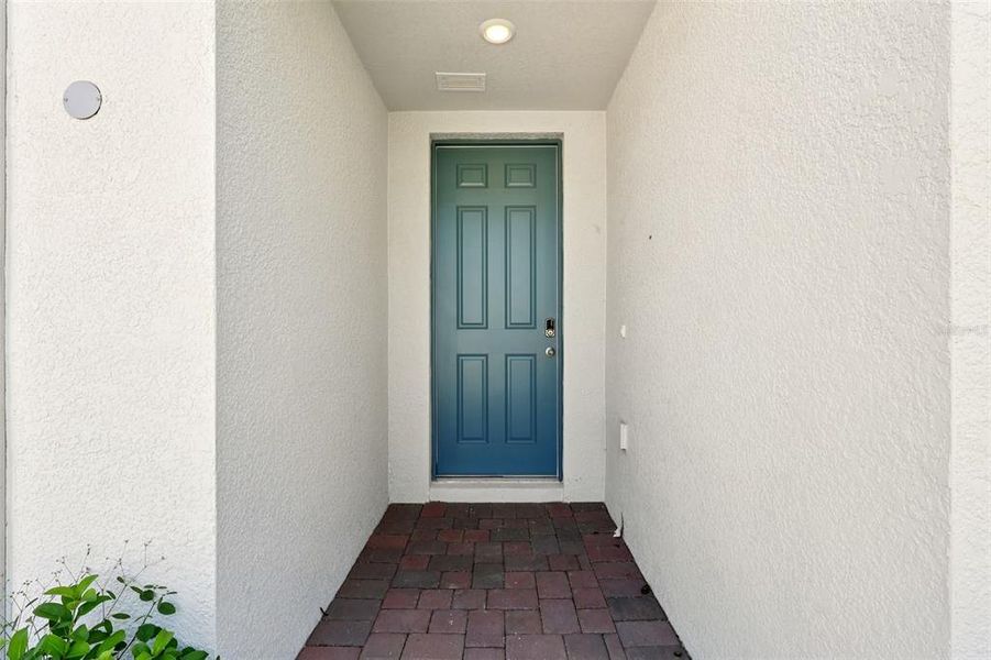 Exterior details and patio area of a home in Deer Run at Crosswinds, Davenport (Image 4).