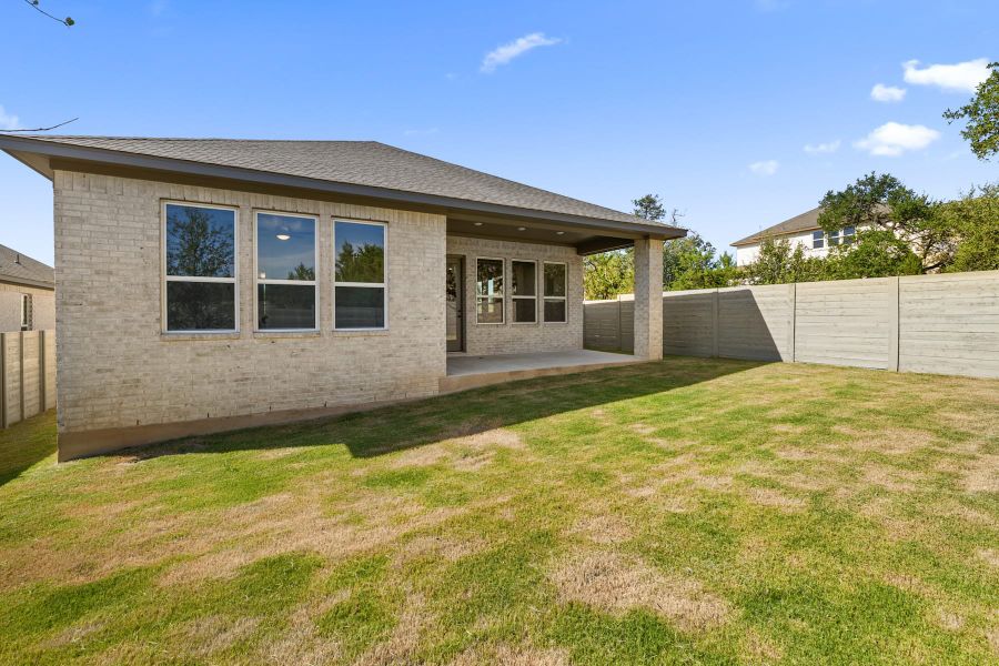 Exterior details and patio area of a home in Wolf Ranch, Georgetown (Image 24).