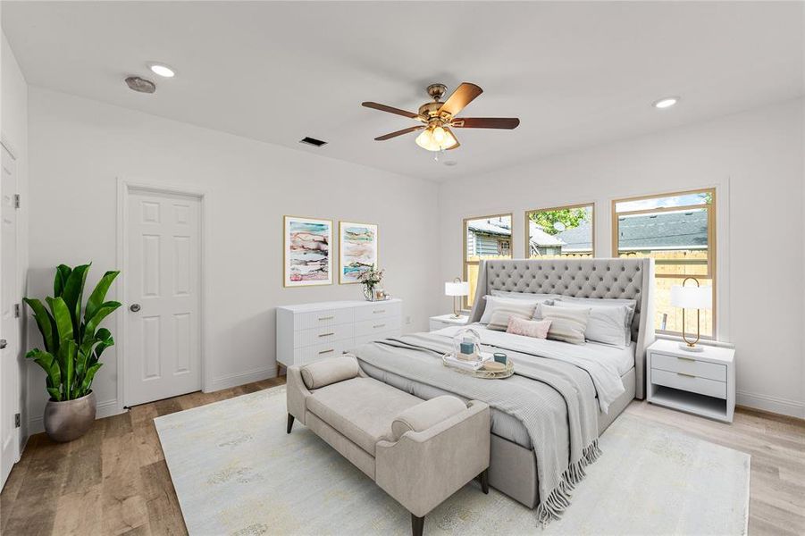 Bedroom featuring light wood-type flooring and ceiling fan