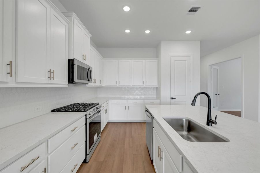 Furnished interior view inside a new home in Jubilee - Reserve Collection, Hockley (Image 9).