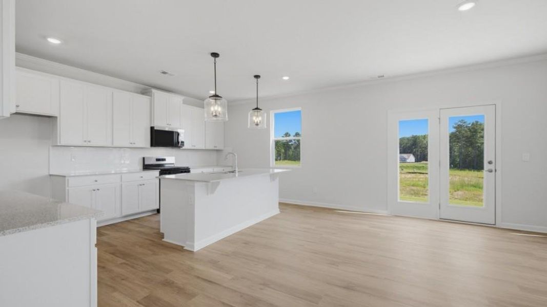 Furnished interior view inside a new home in Fairway 17 at Mirror Lake, Villa Rica (Image 10).