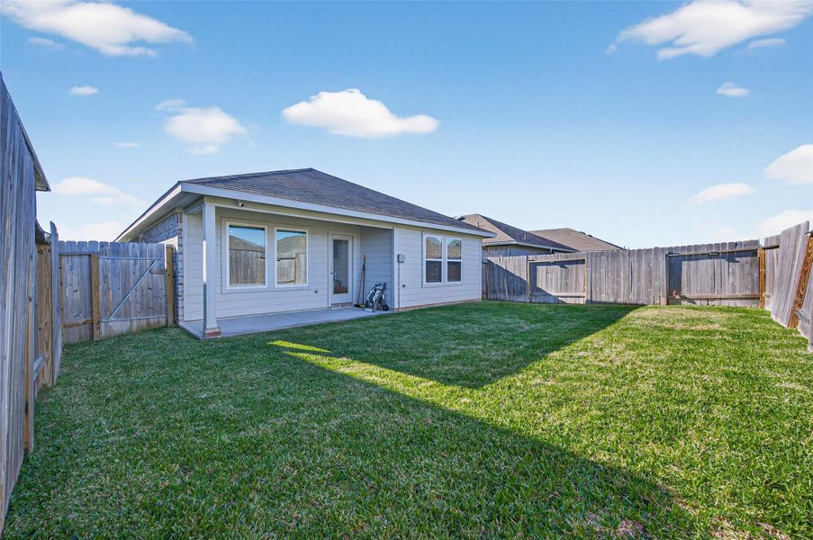 Exterior details and patio area of a home in , Spring (Image 26). Exterior details and patio area of a home in , Spring (Image 26).