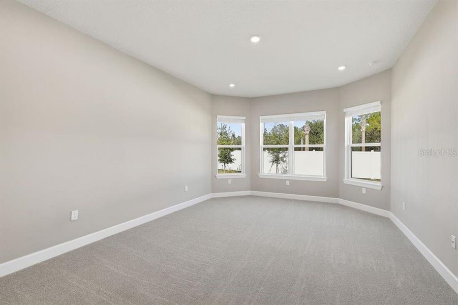 Spacious, unfurnished interior of a new home in Esplanade at Westview, Kissimmee (Image 31).