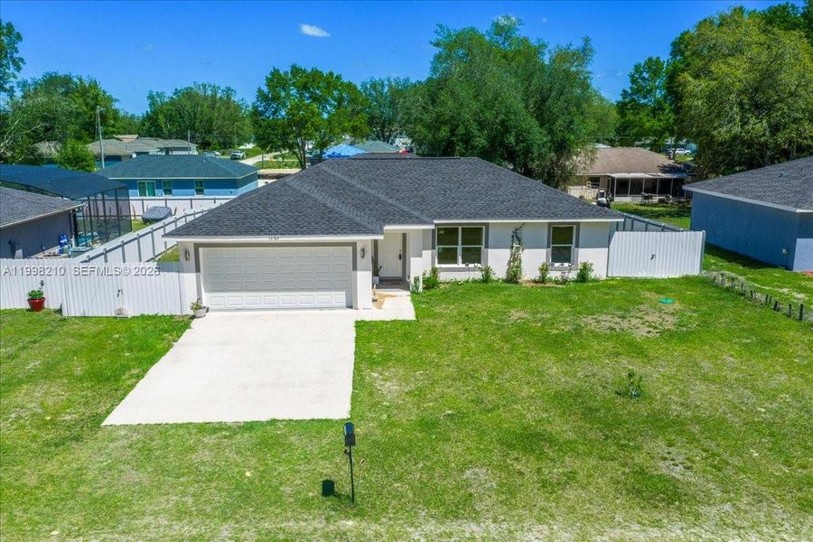 Front exterior of a new home in , Ocala, FL, highlighting curb appeal (Image 22).
