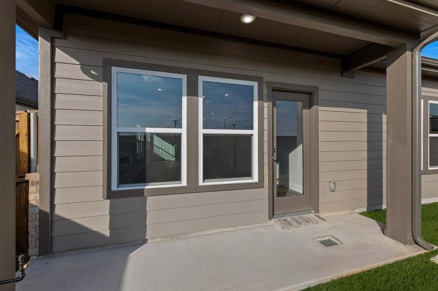 Exterior details and patio area of a home in The Meadows, Krum (Image 30).