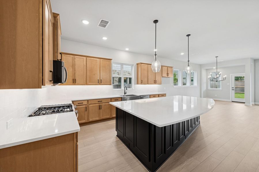 Furnished interior view inside a new home in Meridiana 55' Homesites, Manvel (Image 7).