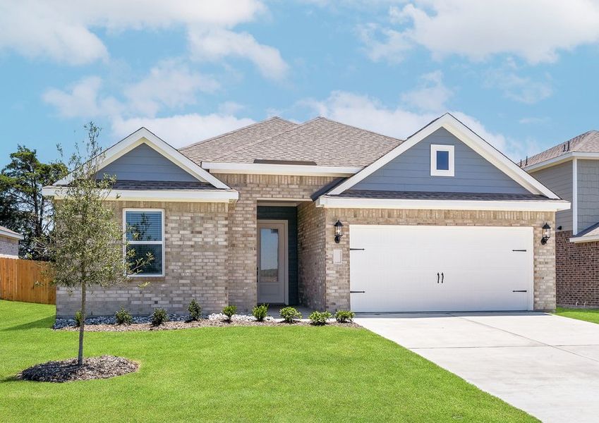 The one-story Reed floor plan has a brick exterior with siding accents.