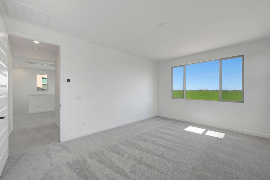 Spacious, unfurnished interior of a new home in Soleo, San Tan Valley (Image 29).