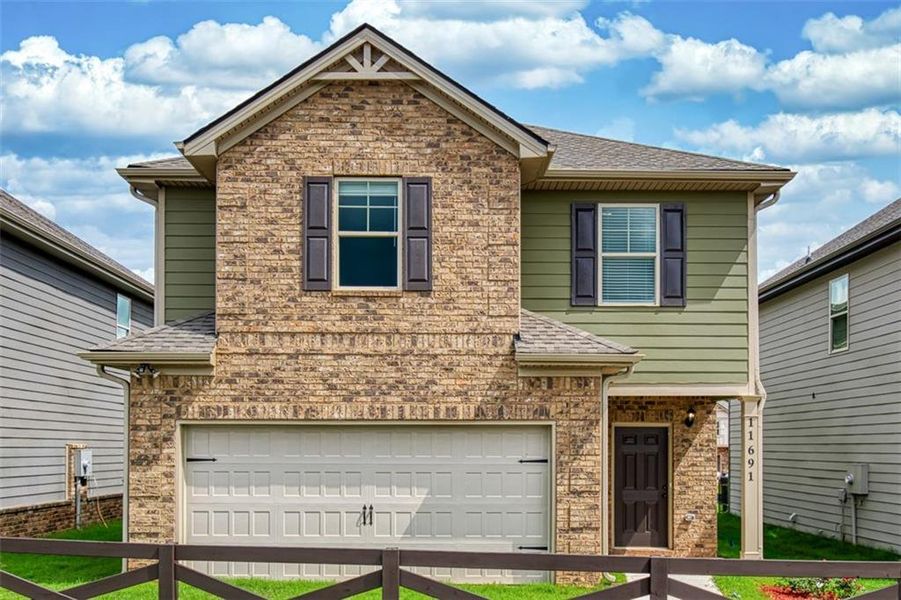 Front exterior of a new home in Westminster, Covington, GA, highlighting curb appeal (Image 22).