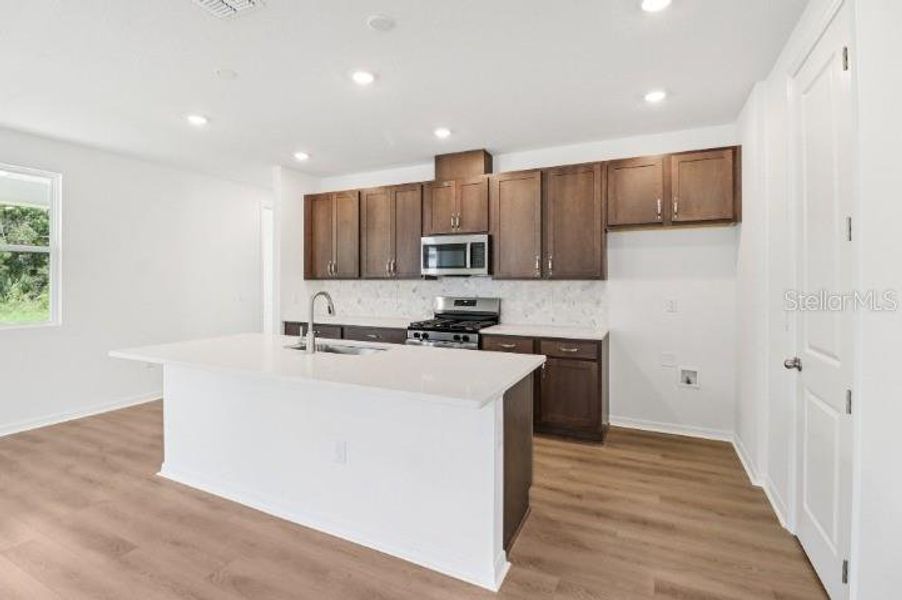 Furnished interior view inside a new home in Northlake at Ovation, Winter Garden (Image 7).