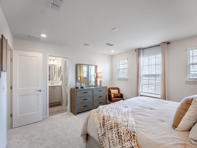 Sweet dreams await in your owner`s suite - Aria bungalow by Highland Homes