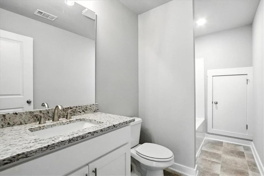 Furnished interior view inside a new home in Traditions of Braselton, Jefferson (Image 29).