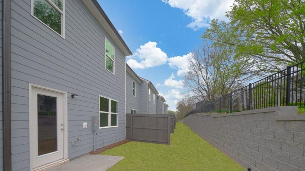 Exterior details and patio area of a home in Roseleigh Park, Douglasville (Image 4).