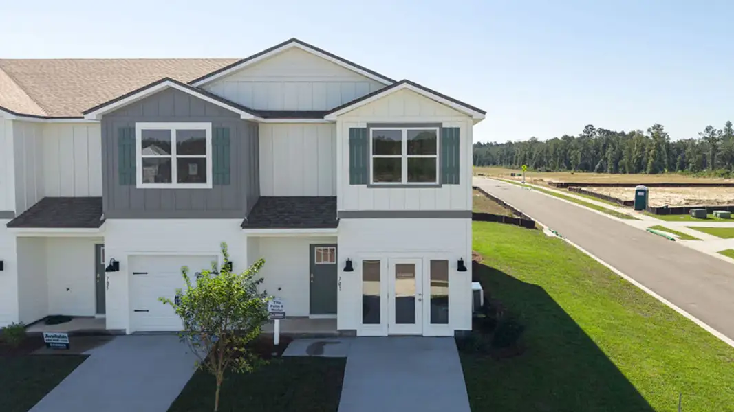 Front exterior of a new home in Abilene Acres, Tallahassee, FL, highlighting curb appeal (Image 29).
