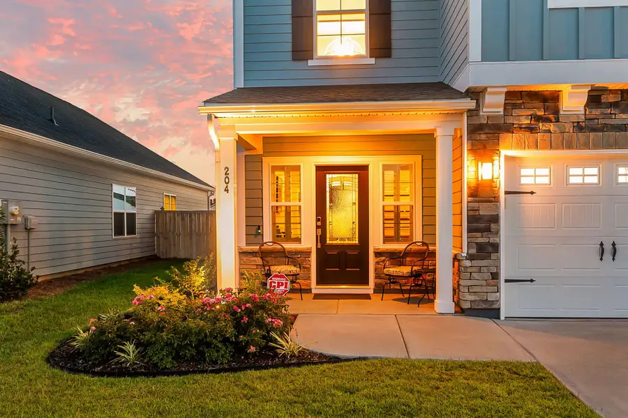 Exterior details and patio area of a home in Hewing Farms, Summerville (Image 24).