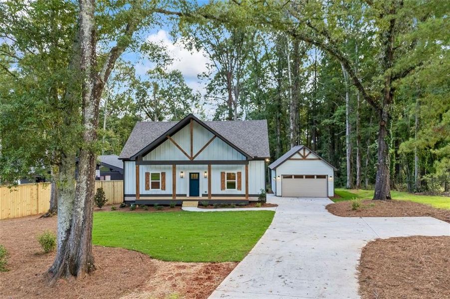 Front exterior of a new home in , Monroe, GA, highlighting curb appeal (Image 41).