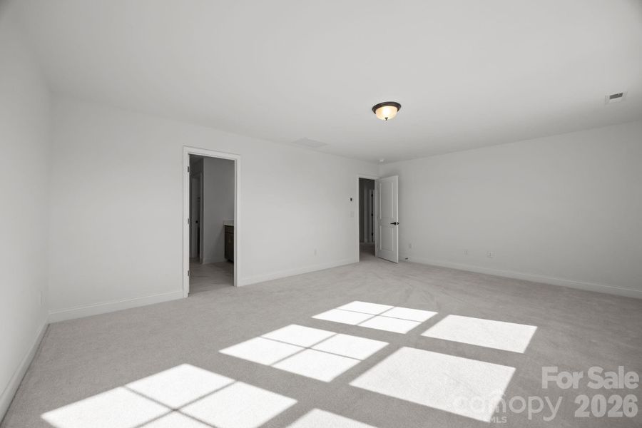 Primary BedroomPhotos are representative and may not reflect the exact home, finishes, or features.