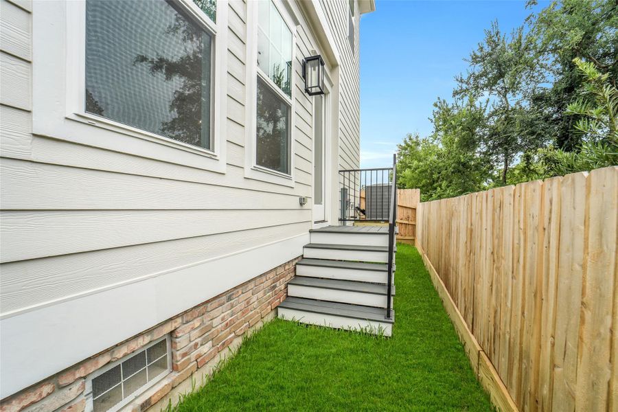 Exterior details and patio area of a home in , Houston (Image 27).