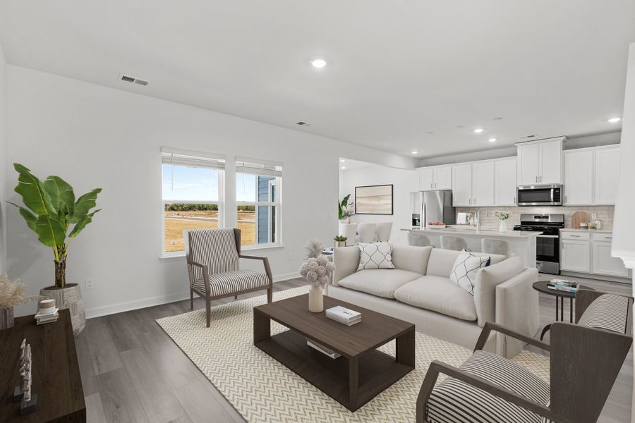 Furnished interior view inside a new home in Waterside - Boardwalk Series, Longs (Image 3).