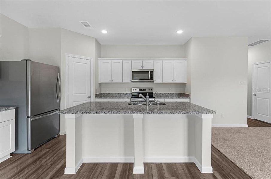 Furnished interior view inside a new home in Oakfield Lakes, Parrish (Image 4).