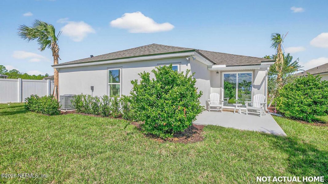 Exterior details and patio area of a home in Sawmill Branch, Palm Coast (Image 3).