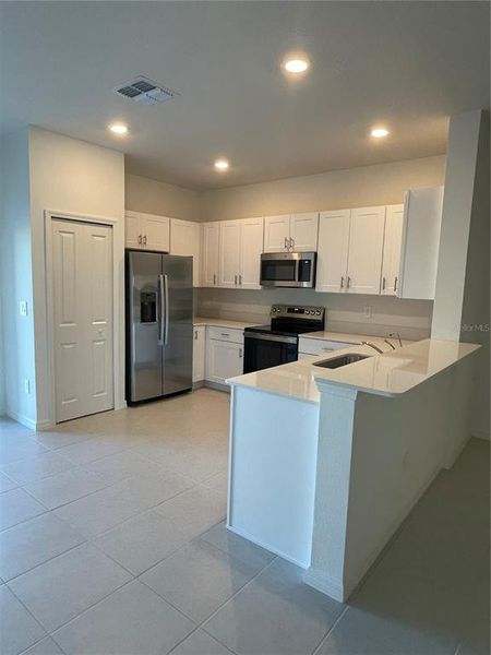 Furnished interior view inside a new home in , Zephyrhills (Image 3). Furnished interior view inside a new home in , Zephyrhills (Image 3).