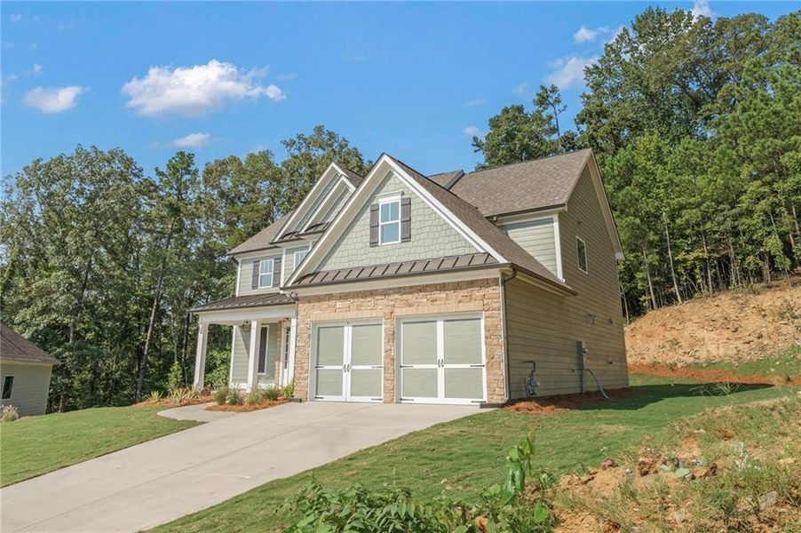 Front exterior of a new home in , Dallas, GA, highlighting curb appeal (Image 17). Front exterior of a new home in , Dallas, GA, highlighting curb appeal (Image 17).