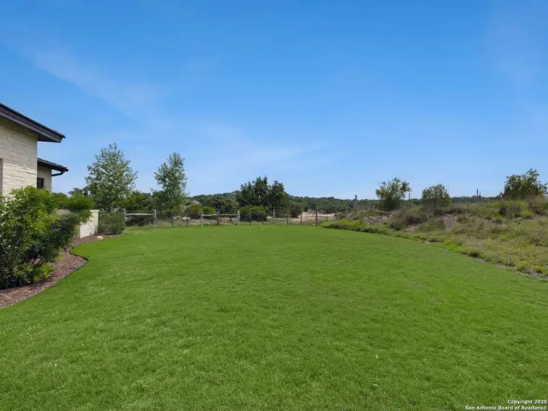 Front exterior of a new home in , Boerne, TX, highlighting curb appeal (Image 2).