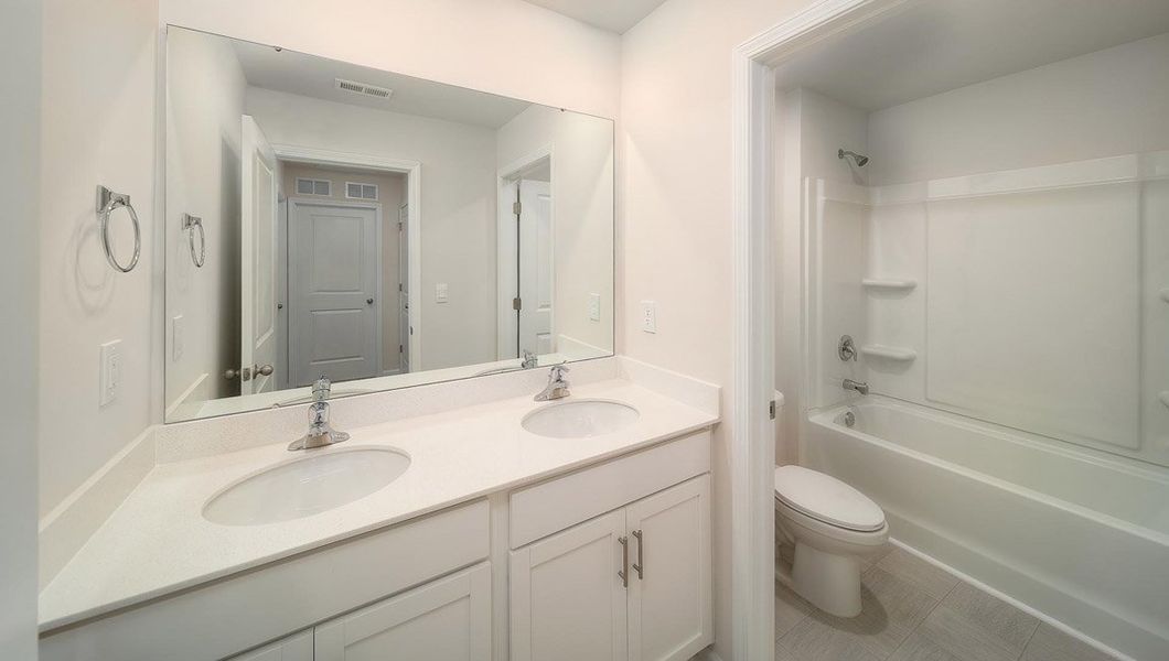 Representative furnished interior of a home built from the TAYLOR by D.R. Horton in Gibson Grove, Laurens (Image 7).