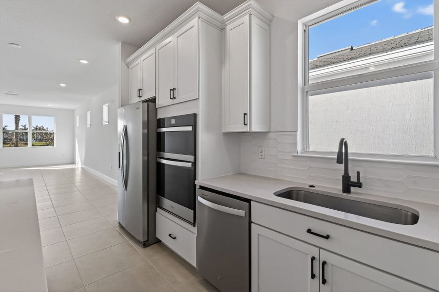 Furnished interior view inside a new home in Costa Pointe, Vero Beach (Image 18).
