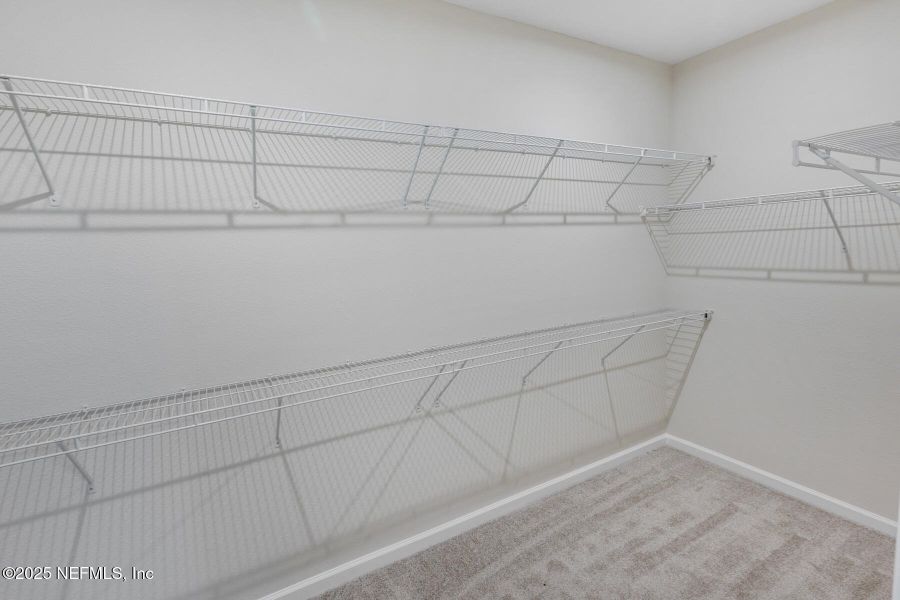 Spacious, unfurnished interior of a new home in Lakes at Bella Lago, Green Cove Springs (Image 19).