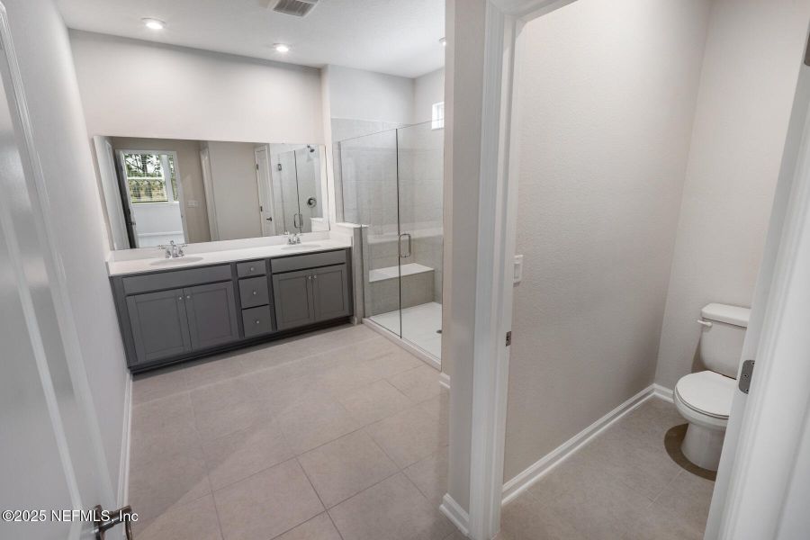 Furnished interior view inside a new home in Lakes at Bella Lago, Green Cove Springs (Image 7).