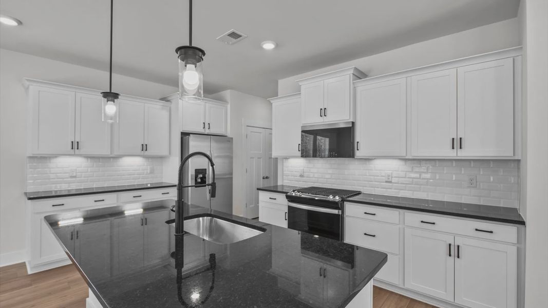 Representative furnished interior of a home built from the Jasmine by DRB Homes in Pleasant Falls, Moore (Image 6).