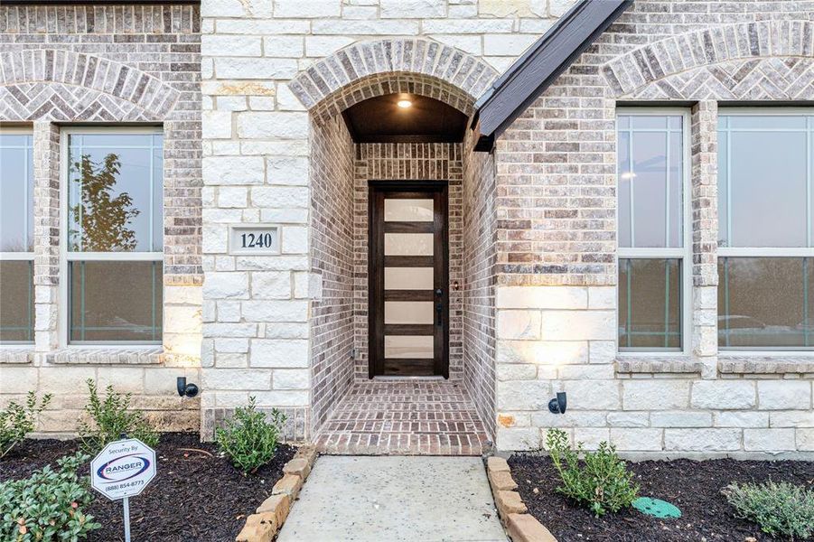 Exterior details and patio area of a home in The Oaks, Red Oak (Image 3). Exterior details and patio area of a home in The Oaks, Red Oak (Image 3).