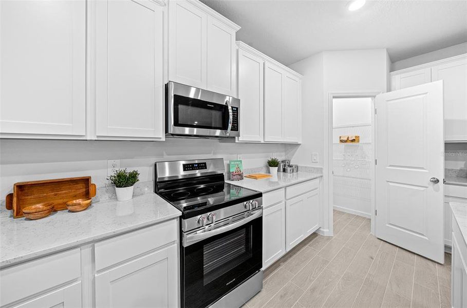Furnished interior view inside a new home in Pioneer Ranch: Pioneer Ranch 60's, Ocala (Image 17).
