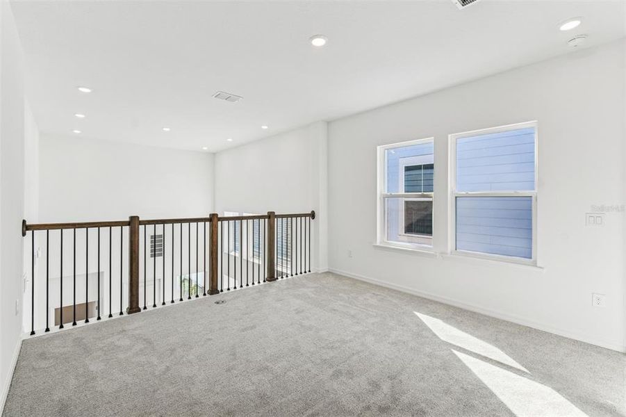 Spacious, unfurnished interior of a new home in Laureate Park at Lake Nona - Garden Series, Orlando (Image 18).