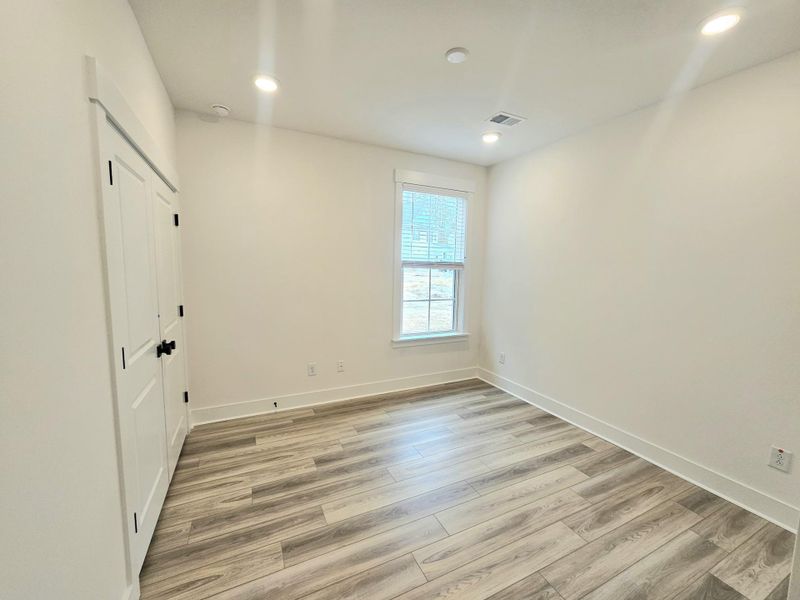 Spacious, unfurnished interior of a new home in Creekside at Andrews, Summerville (Image 16).