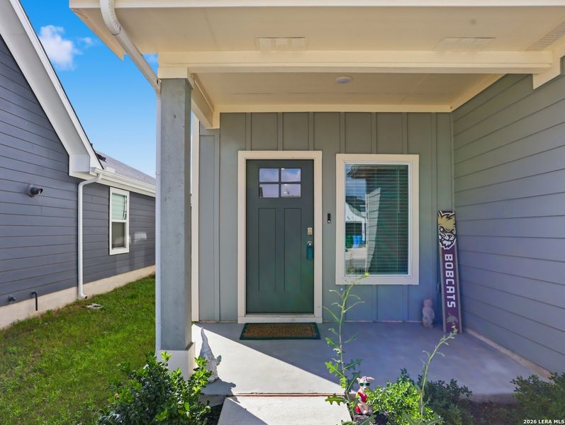Exterior details and patio area of a home in Watermill, Uhland (Image 24).
