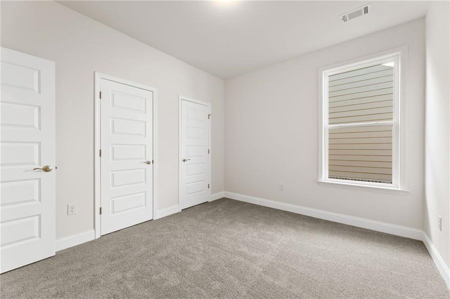 Spacious, unfurnished interior of a new home in Cooper's Walk, Loganville (Image 13).