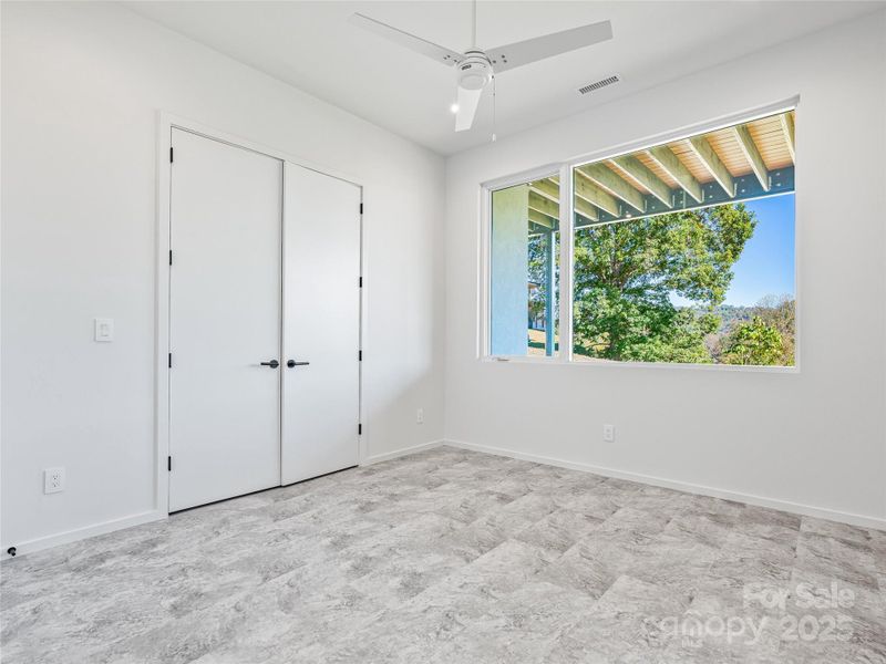 Spacious, unfurnished interior of a new home in , Asheville (Image 19).