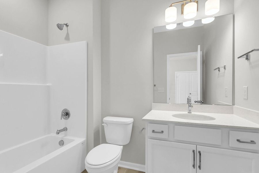 Furnished interior view inside a new home in Tidewater at Lakes of Cane Bay, Summerville (Image 7). Furnished interior view inside a new home in Tidewater at Lakes of Cane Bay, Summerville (Image 7).