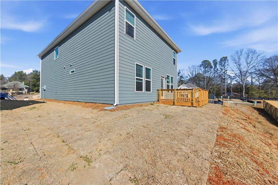 Exterior details and patio area of a home in Enclave at Evergreen, Fairburn (Image 4).