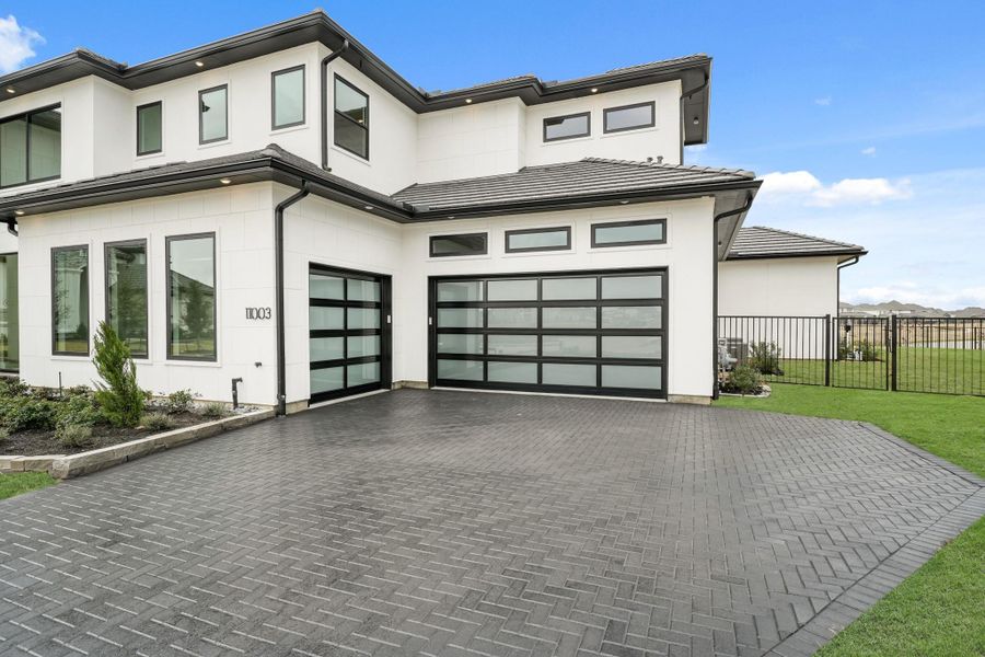 Front exterior of a new home in Bridgeland, Cypress, TX, highlighting curb appeal (Image 25).