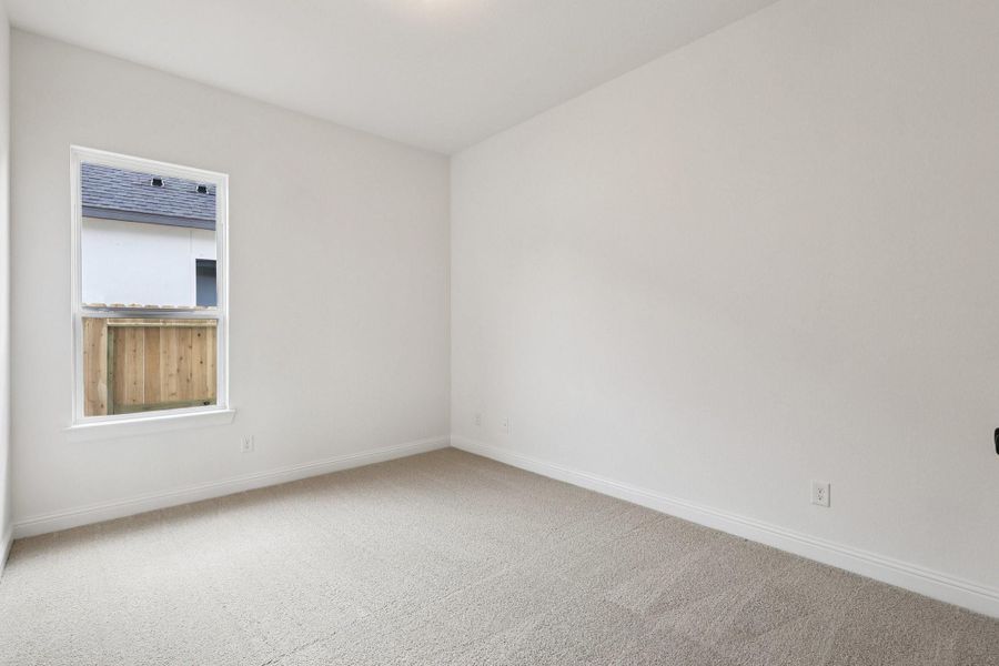 Spacious, unfurnished interior of a new home in Sienna 65', Missouri City (Image 29).