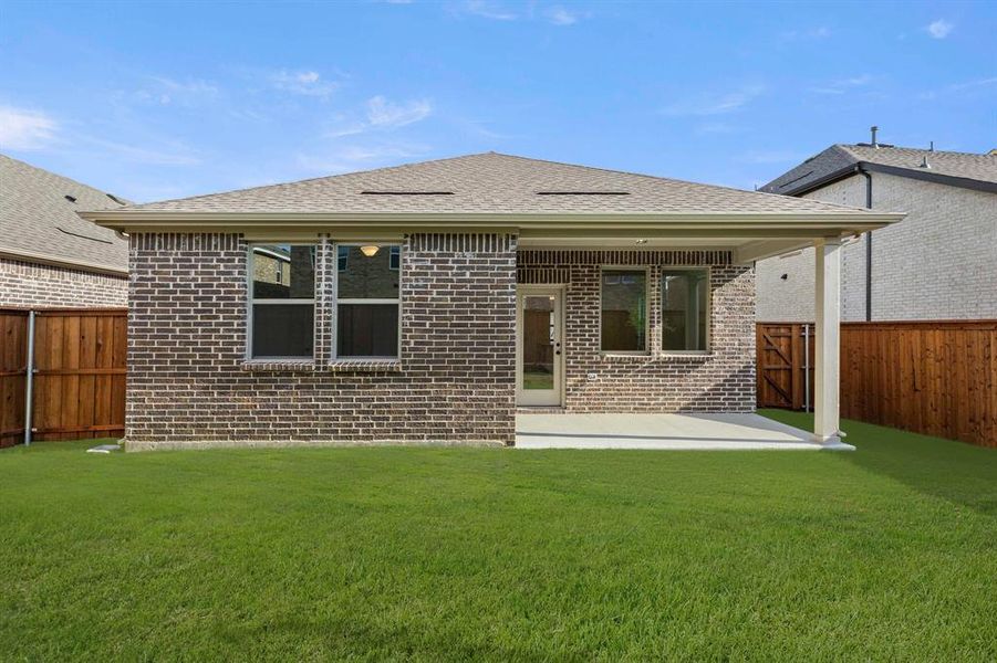 Front exterior of a new home in Creekview Fossil Ridge, Pilot Point, TX, highlighting curb appeal (Image 22).