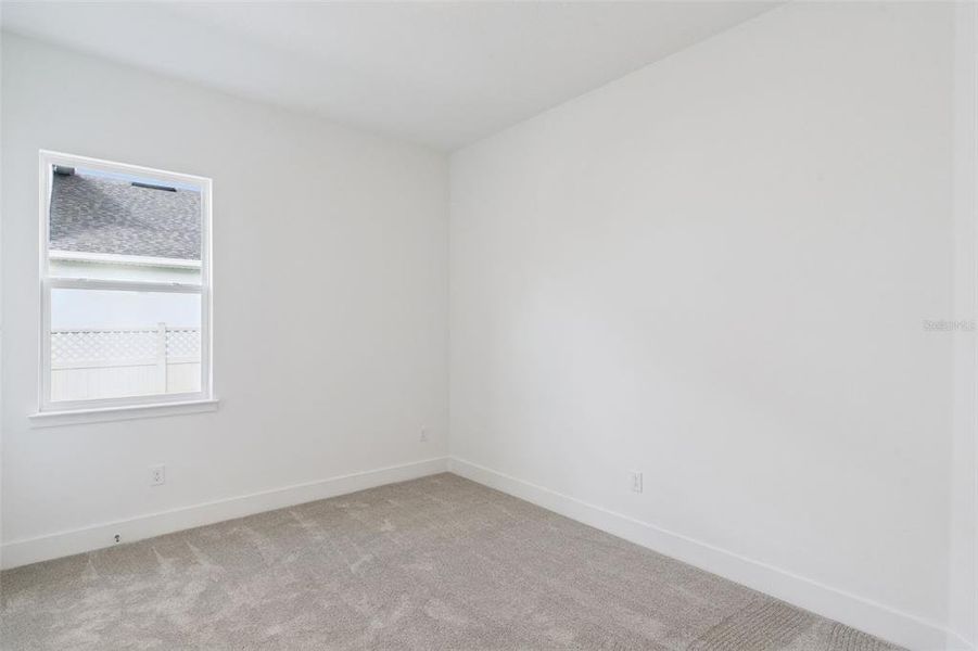 Spacious, unfurnished interior of a new home in Northlake At Ovation, Winter Garden (Image 12).