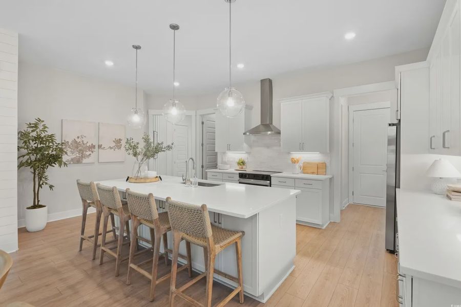 Furnished interior view inside a new home in Long Bay Golf Club, Longs (Image 8).