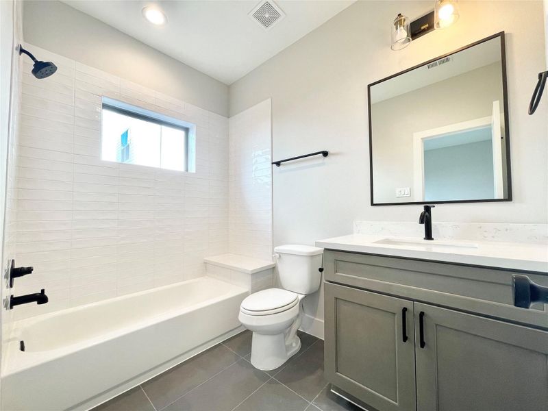 Full Bath on the first door with modern touches. Full Bath on the first door with modern touches.