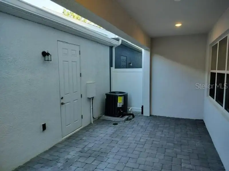 Exterior details and patio area of a home in Loch Leven Park, Mount Dora (Image 3).